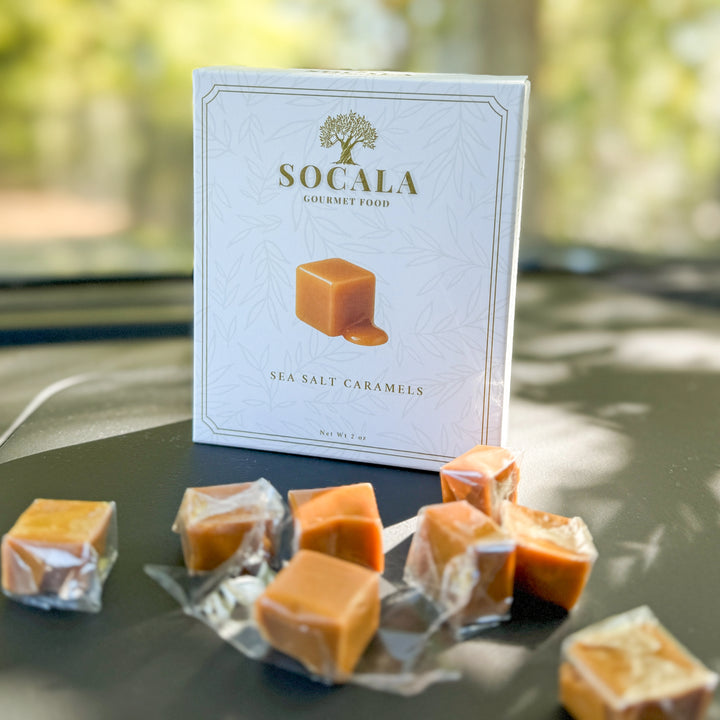 SOCALA gourmet sea salt caramels on a table outdoors