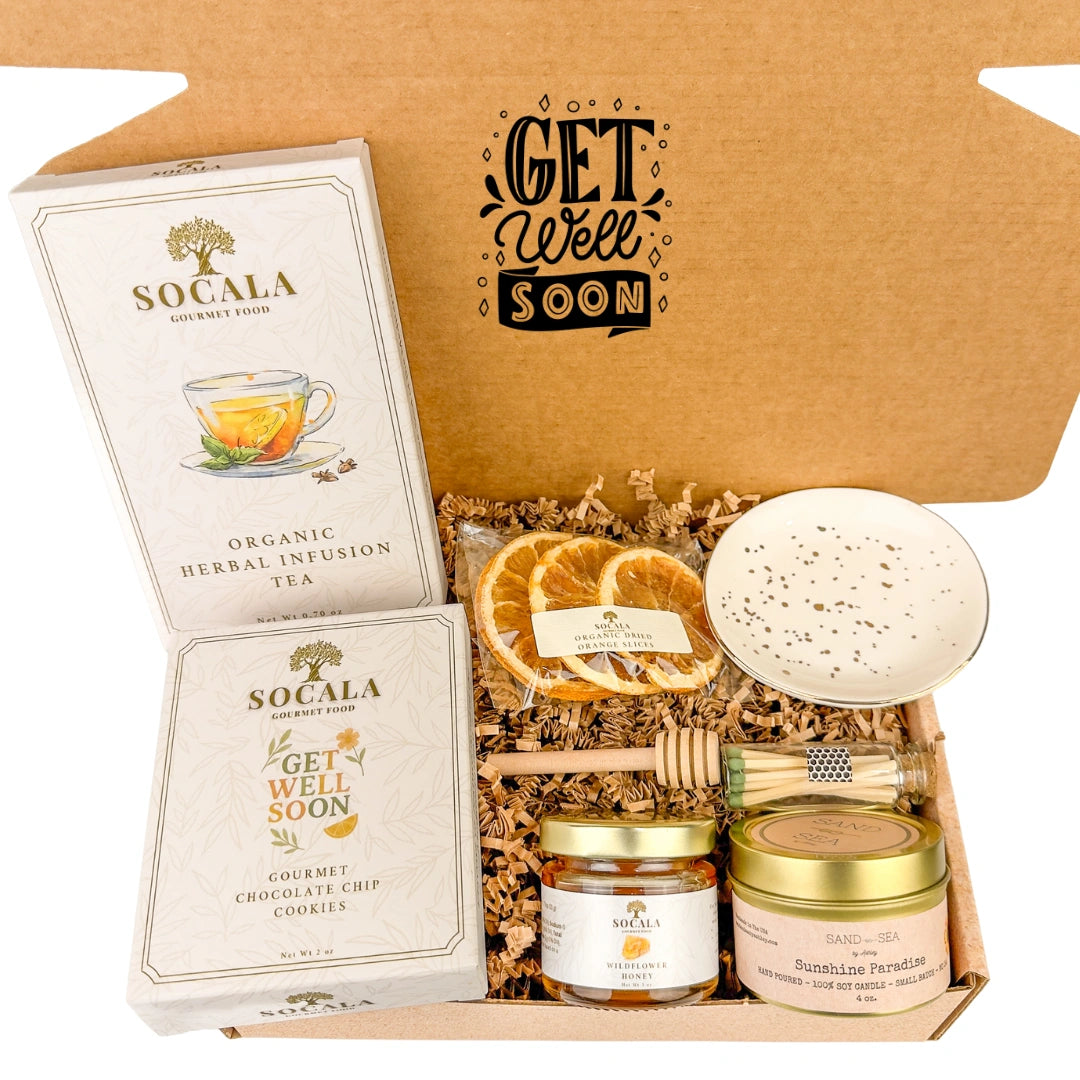 Gourmet gift set with 'Get Well Soon' message, including tea, cookies, and honeycomb.