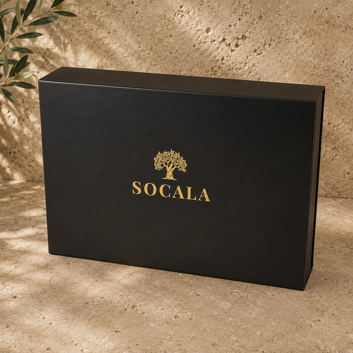 Black box with 'Socala' logo on a textured beige surface