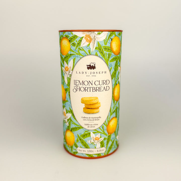 Lemon curd shortbread packaging with floral design on a light gray background