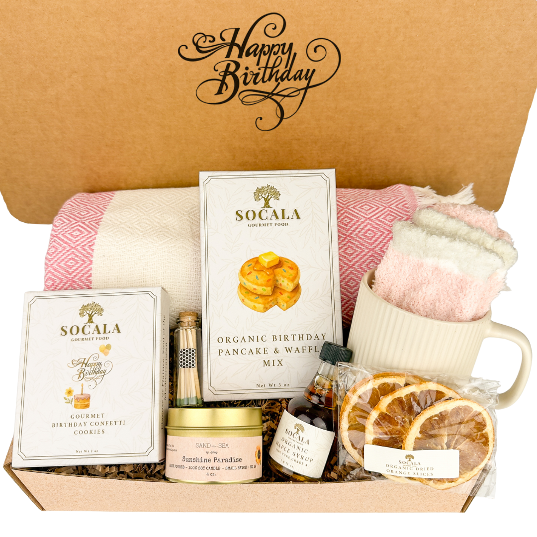 Birthday gift box with 'Happy Birthday' card, SOCALA products, and decorative items.