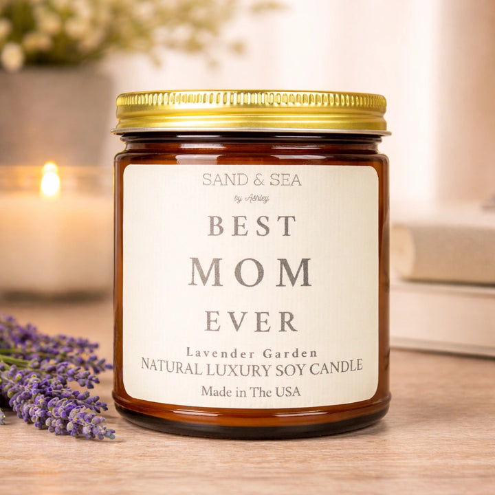 Candle jar labeled 'Best Mom Ever' with lavender on a wooden surface