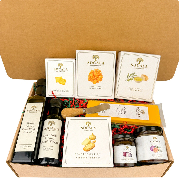 Gourmet gift set with olive oil, cheese, and other items in a box