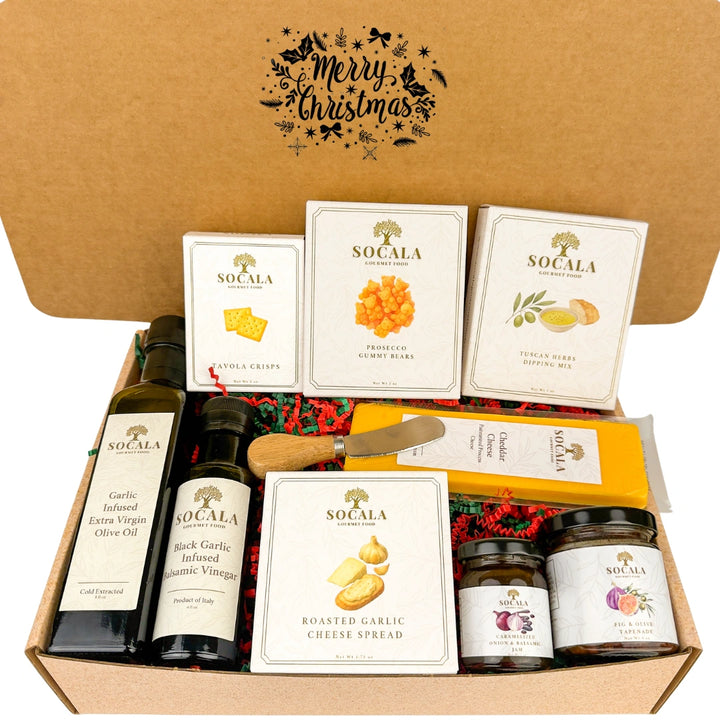 Gourmet gift set with Socala products in a decorative box, featuring 'Merry Christmas' text.
