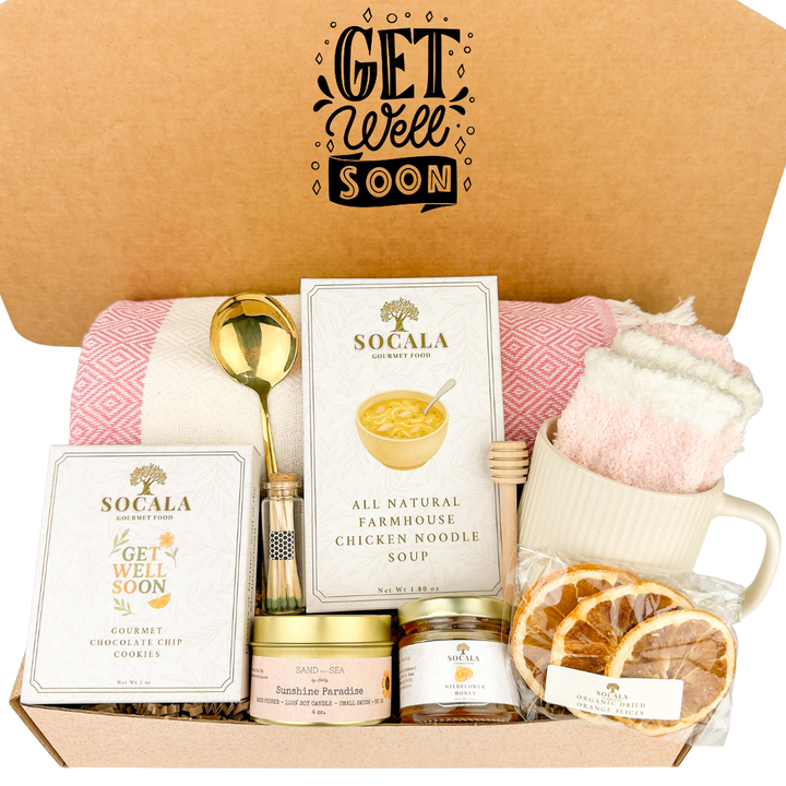 Get well soon care package with soup, cookies, and other items in a box.