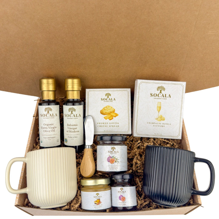 Gift set with mugs, jars, and boxes labeled 'Socala' on a brown background