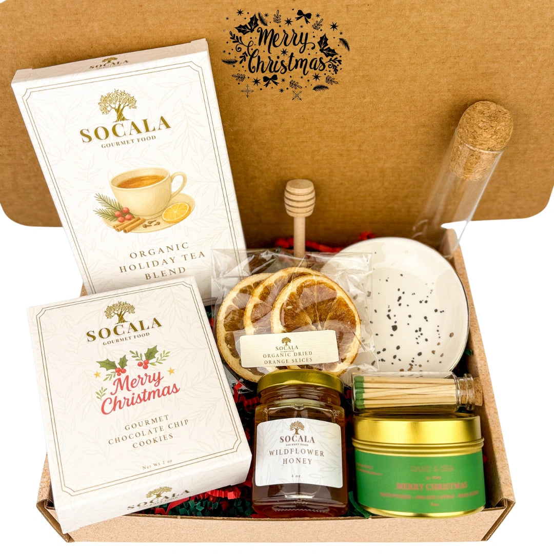 Gift set with Socala tea and honey products in a box, featuring 'Merry Christmas' text.