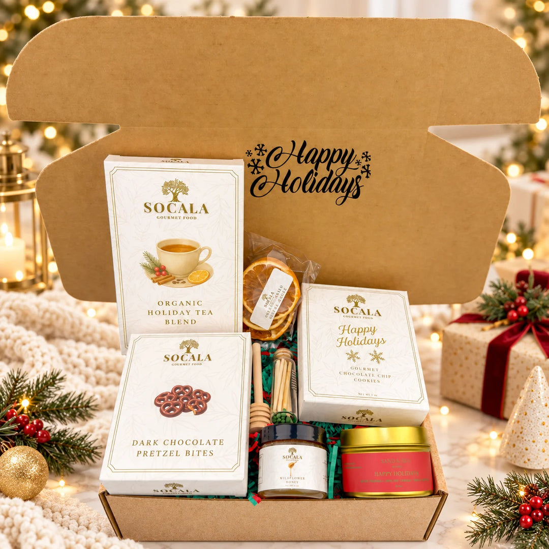 Gift box with Socala tea and cookies, featuring 'Happy Holidays' text.