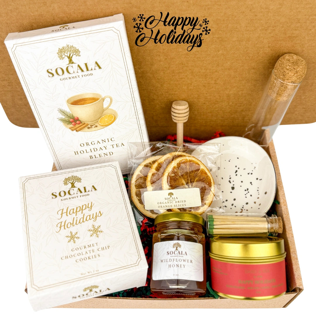Gift box with Socala tea, cookies, honey, and other items with 'Happy Holidays' text.