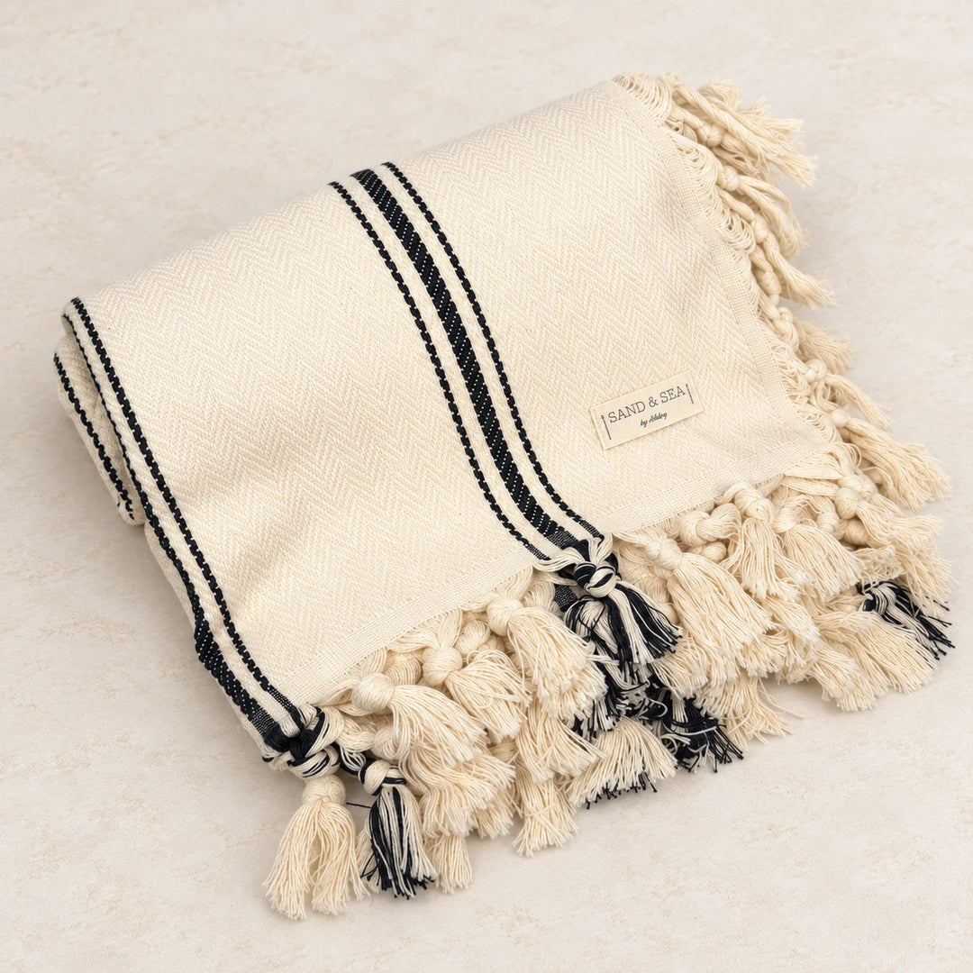 Harvest Coast ivory and charcoal farmhouse throw blanket with knotted fringe