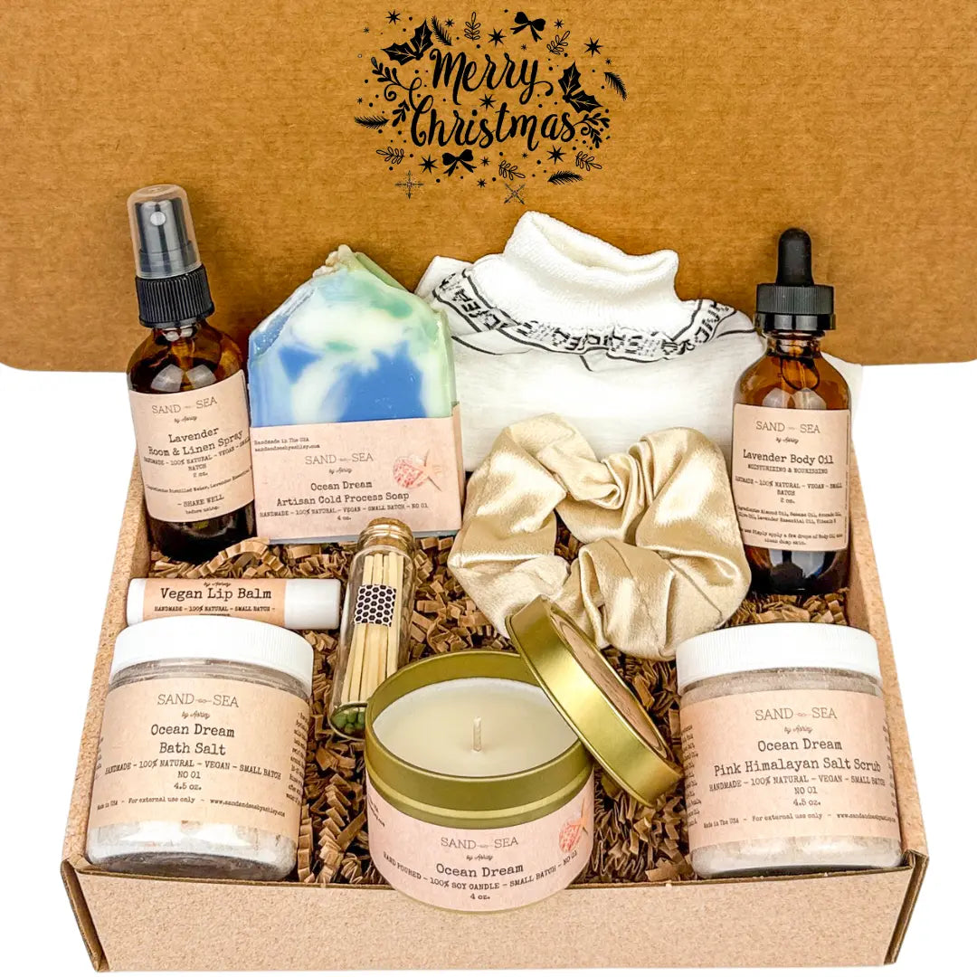 Gift set with skincare and wellness products in a box, featuring 'Merry Christmas' text.