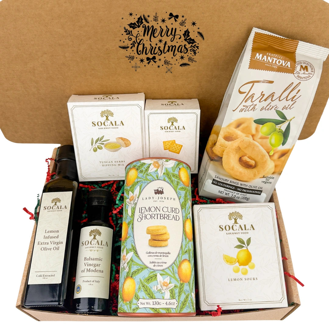 Gourmet gift box with olive oil, shortbread, and cookies on a white background