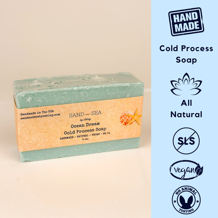 Handmade cold process soap bar with branding and certification icons on a beige background