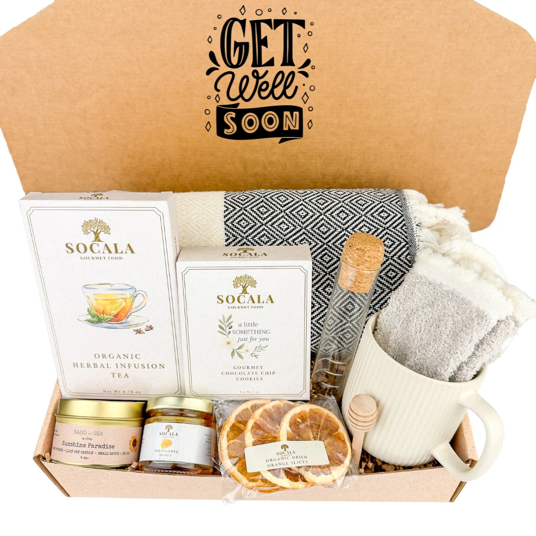 Get well soon care package with tea, snacks, and a mug in a box.