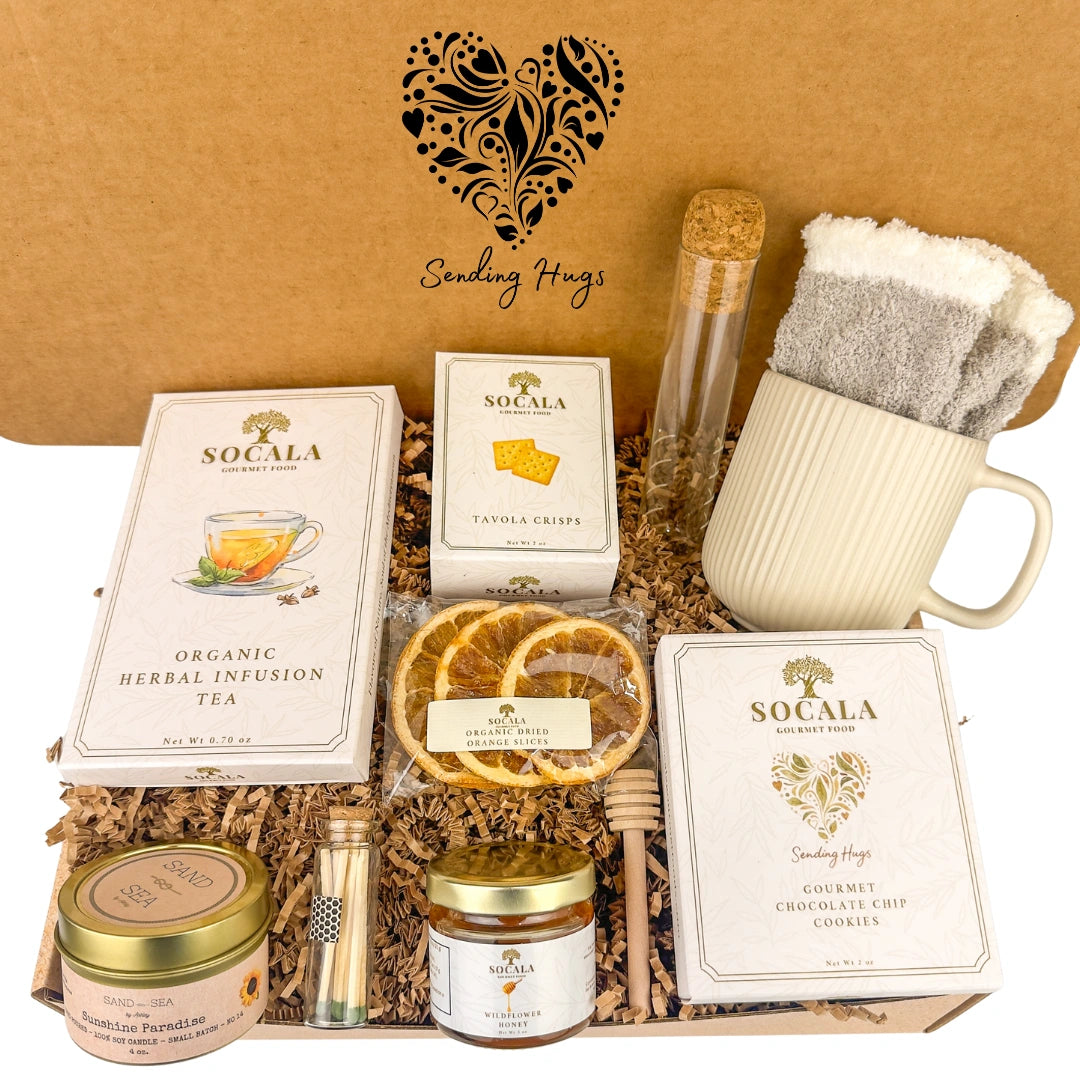 Gift set with tea, cookies, and other items in a box labeled 'Sending Hugs'.