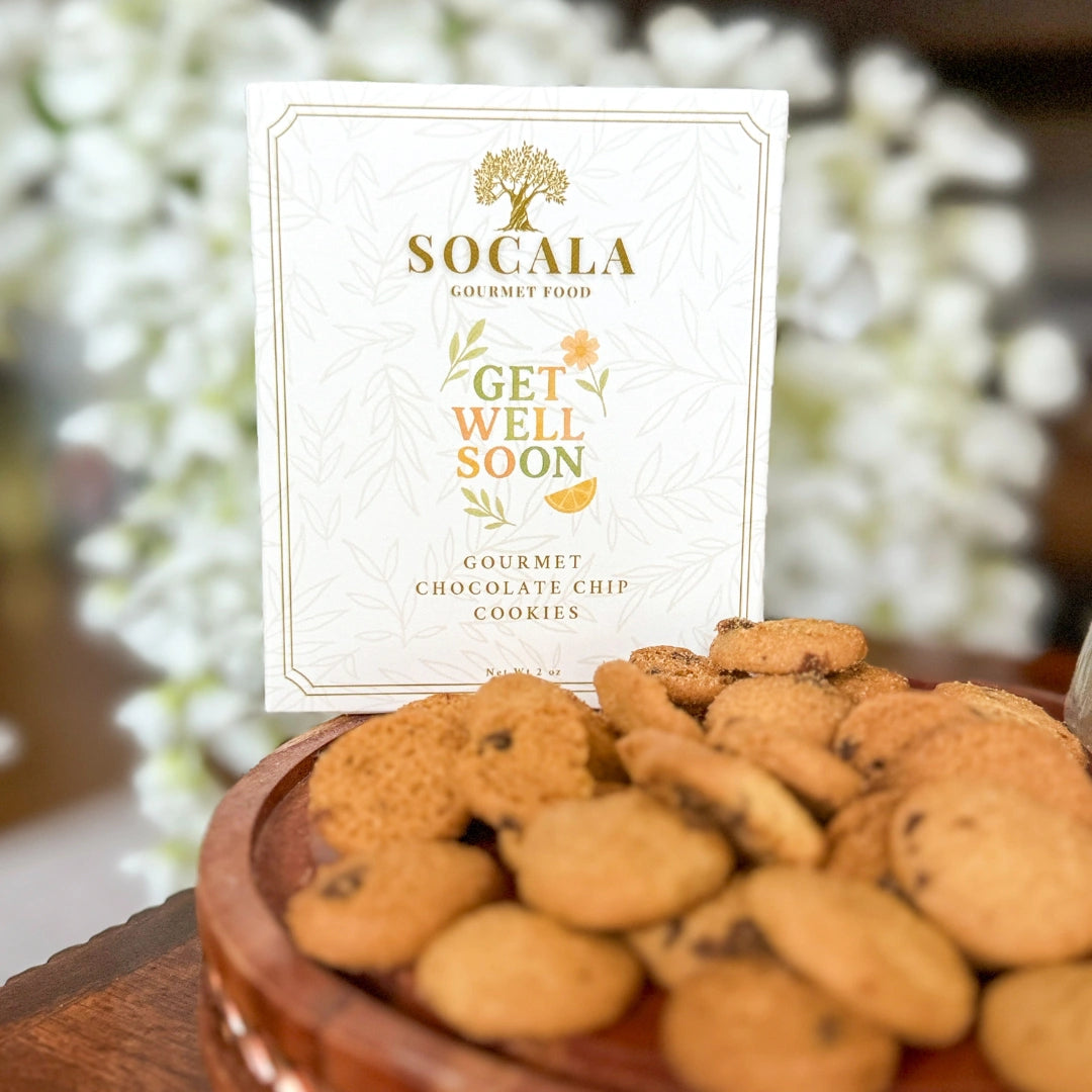Bowl of cookies with a 'Socala Gourmet Food' card that reads 'Get Well Soon'.