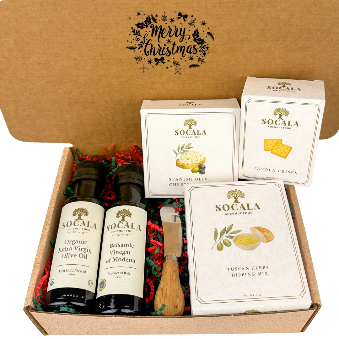 Gift set with Socala olive oil and cheese products in a decorative box.