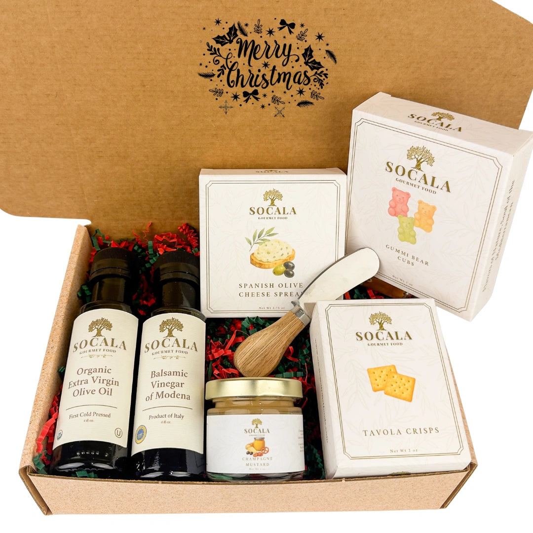Gift set with Socala olive oil products in a decorative box.