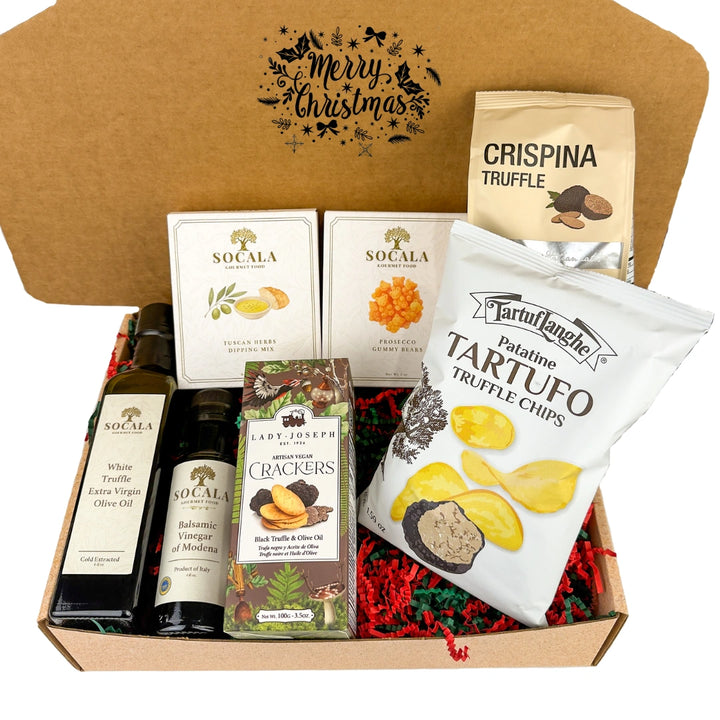 Gourmet gift box with truffle products and olive oil, featuring a 'Merry Christmas' label.