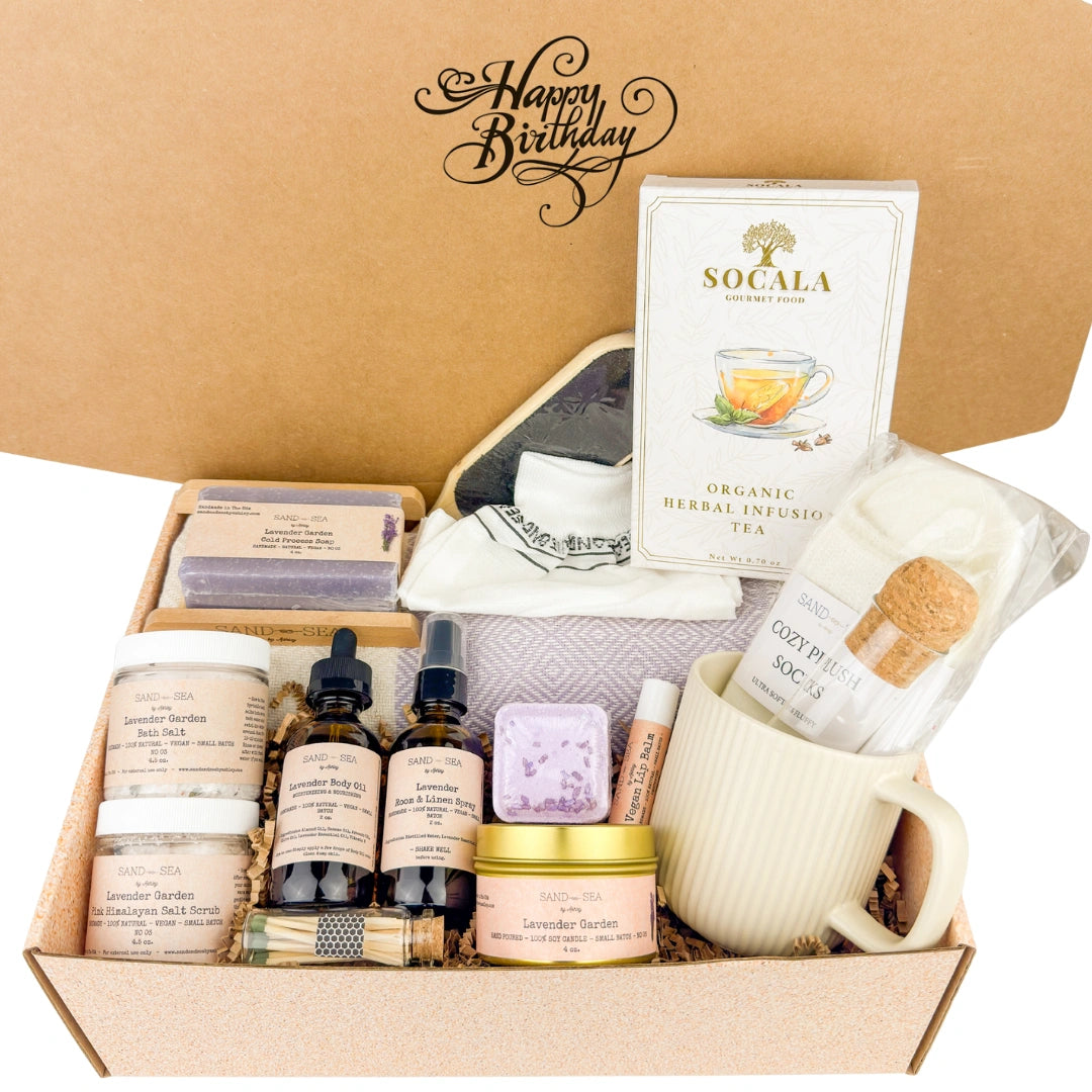 Gift box with skincare products, a mug, and tea, featuring 'Happy Birthday' text.