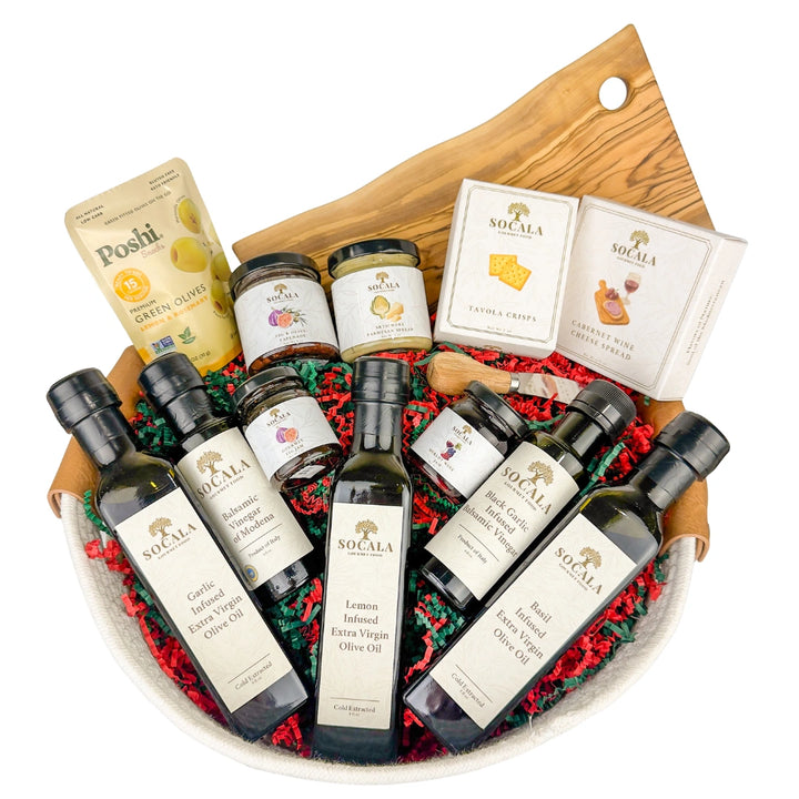 Assorted food items including bottles, jars, and a wooden board on a white background